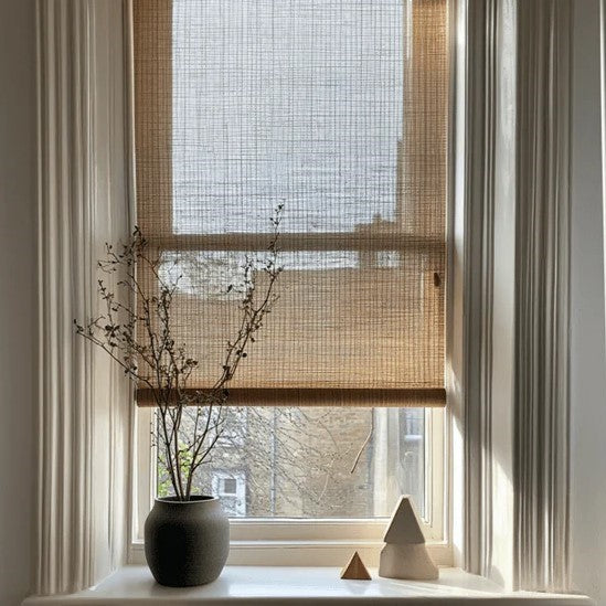 Bamboe rolgordijn voor een raam